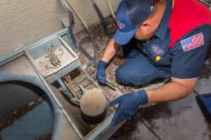 Technician performing repairs