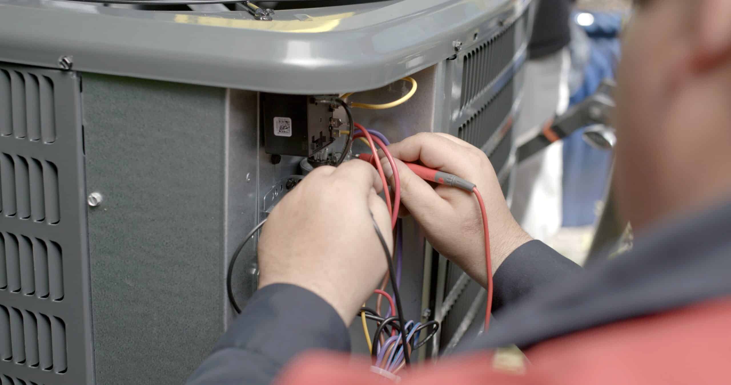 Man repairing air conditioner