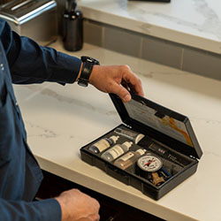 Goettl technician opening water quality test kit