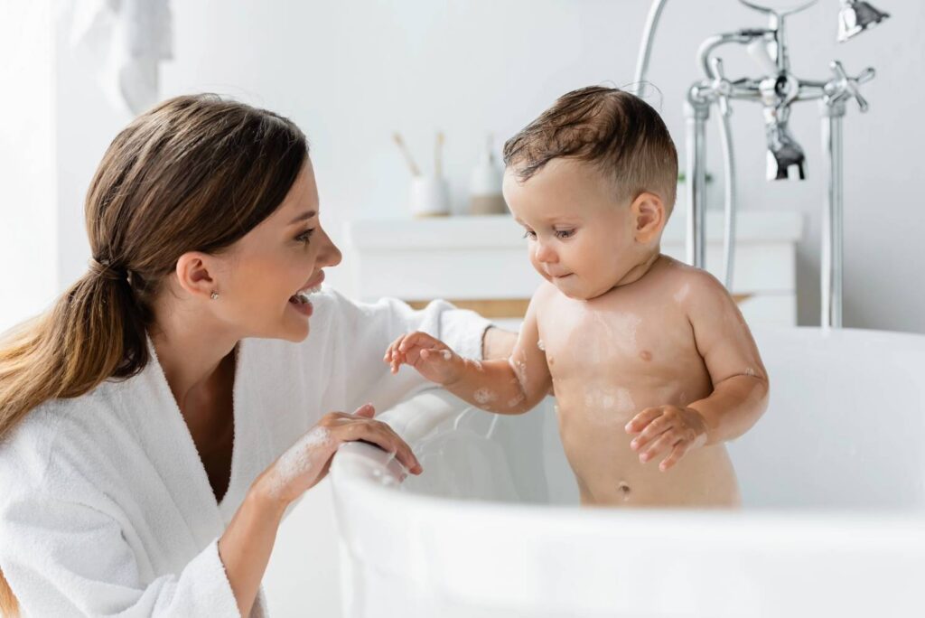 Mother and Son Enjoying Hot Water During Bathtime – Goettl Water Heater Services