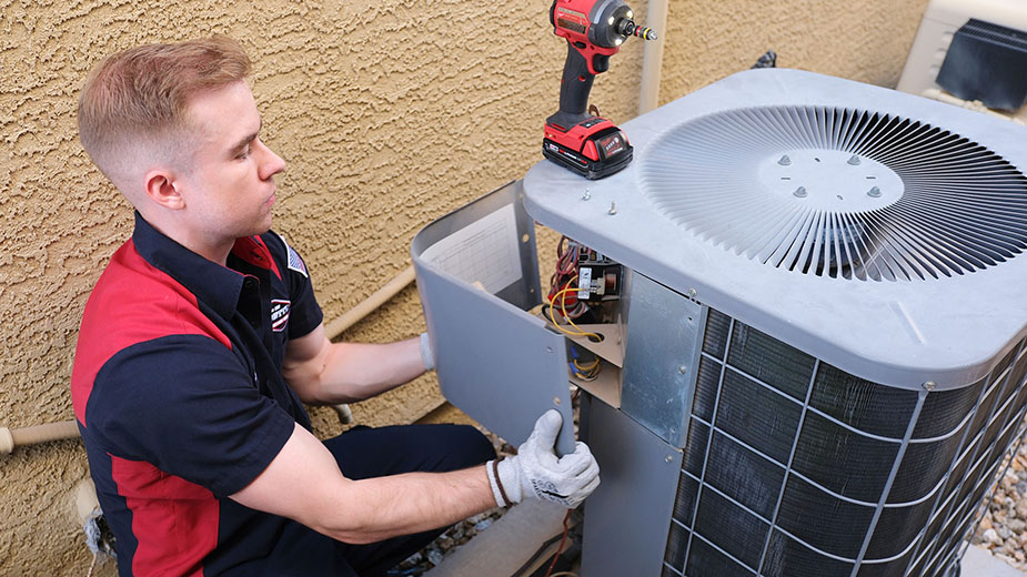 Goettl technician performing an AC Rejuuuvenation service
